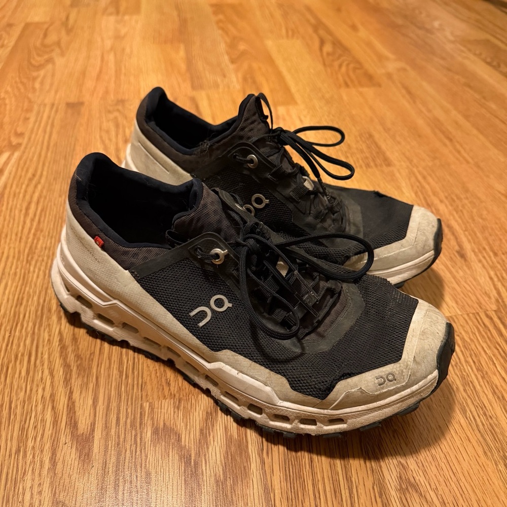 On Trail Running Black and Cream Women's Athletic Shoes
